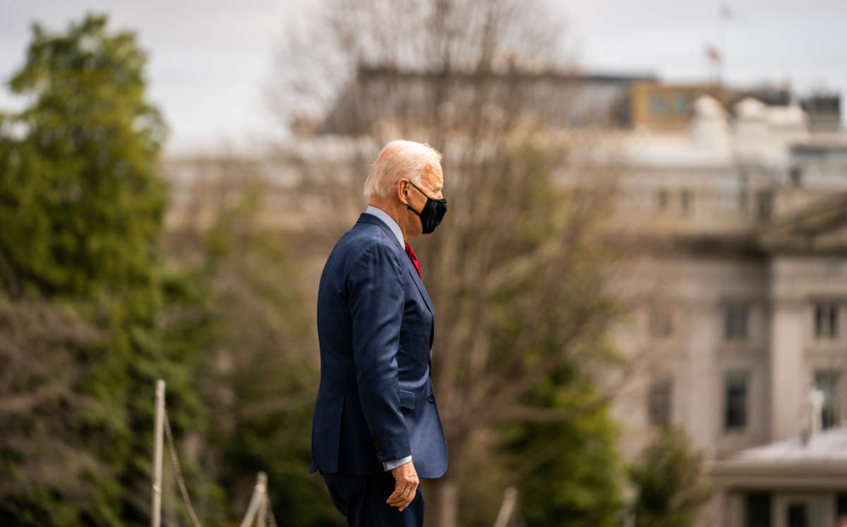 President Joe Biden walks to board Marine One on the south lawn of the White House on March 23, 2021.