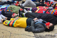 Indigenous youth held a die-in in front of the U.S. Army Corps of Engineers office in Washington, D.C. on April 1, 2021, to represent the lives lost due to environmental destruction and pipelines.