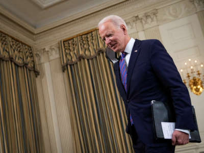 President Joe Biden departs after speaking in the State Dining Room of the White House on April 2, 2021, in Washington, D.C.