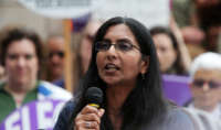 Seattle City Councilmember Kshama Sawant speaks to several hundred people gathered outside of City Hall on May 20, 2019.