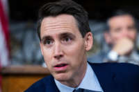 Sens. Josh Hawley, left, and Ted Cruz are seen in Dirksen Building on December 10, 2020.