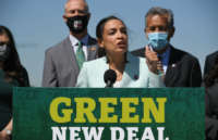 Rep. Alexandria Ocasio-Cortez speaks during a press conference to re-introduce the Green New Deal in front of the U.S. Capitol in Washington, D.C., on April 20, 2021.