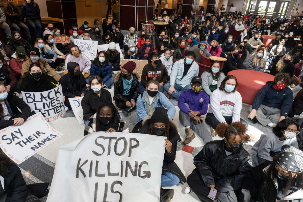 Ohio State University students stage a sit-in demonstration on April 21, 2021, in reaction to the police shooting and killing of Ma'Khia Bryant, 16, the day before.