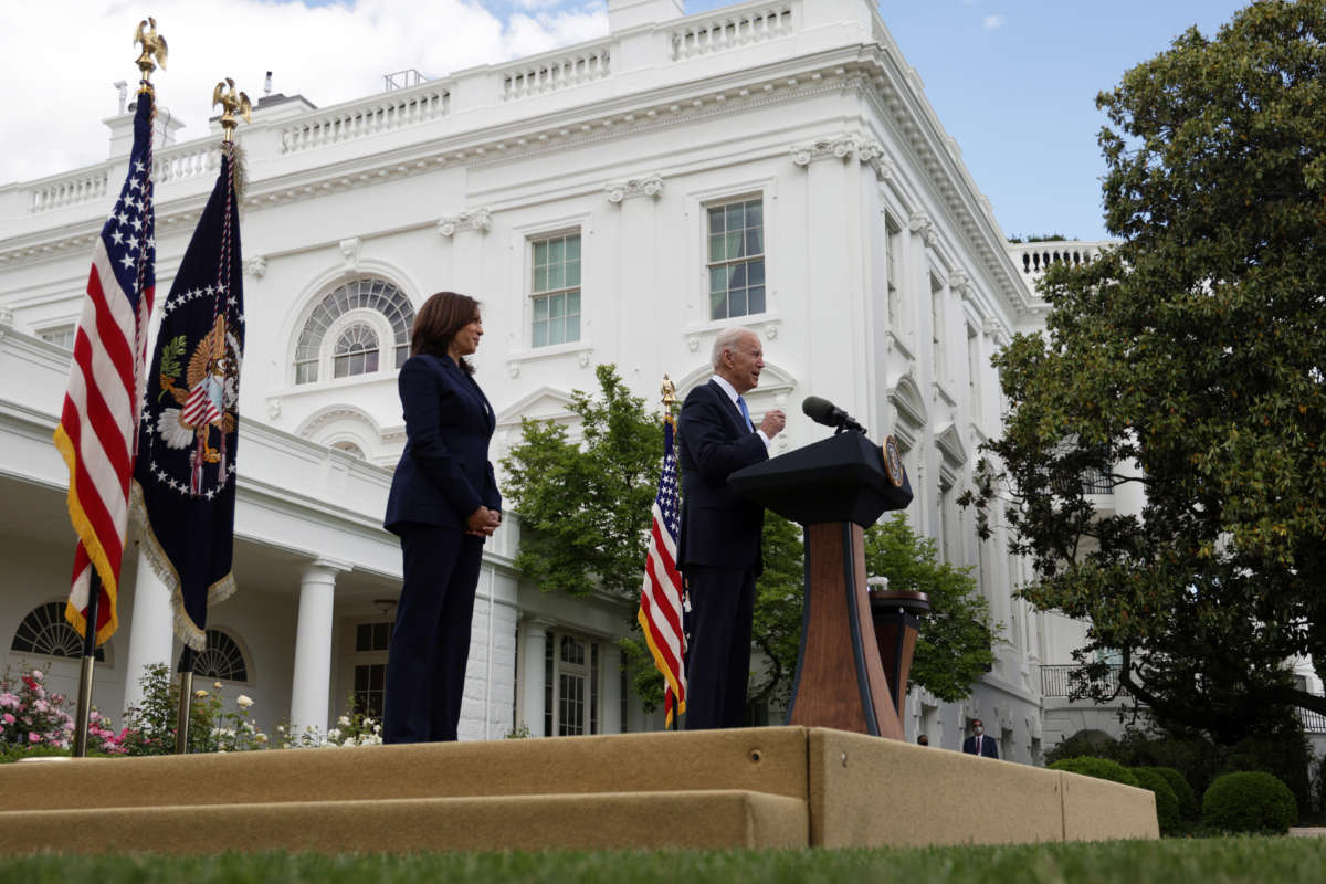 President Joe Biden delivers remarks on the COVID-19 response and vaccination program as Vice President Kamala Harris listens in the Rose Garden of the White House on May 13, 2021, in Washington, D.C.