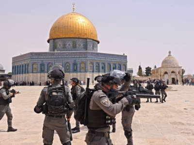 Israeli security forces are pictured at Jerusalem's Al Aqsa mosque compound, the third holiest site of Islam, on May 21, 2021.
