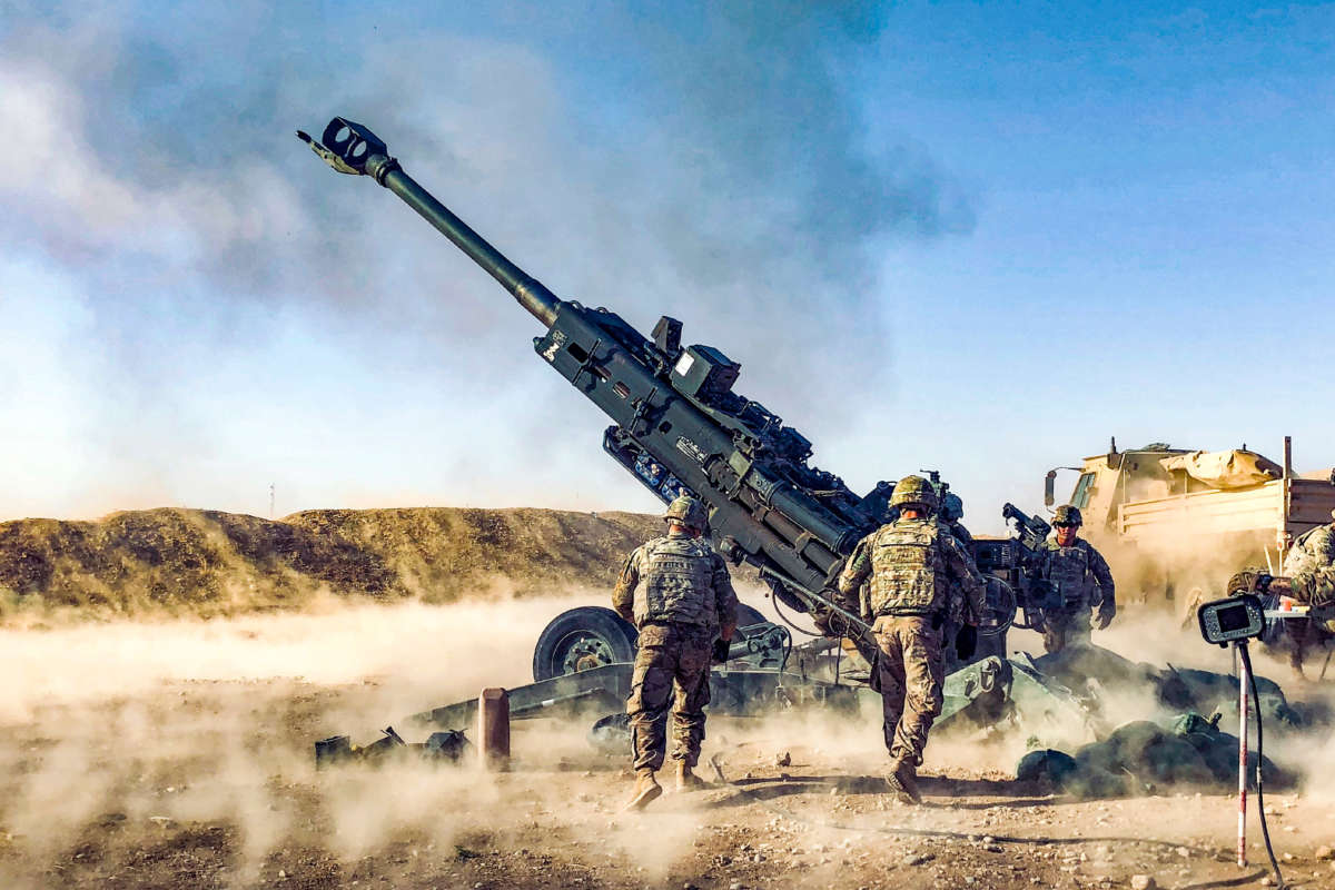 U.S. soldiers fire a howitzer in Iraq, August 12, 2018, while supporting Iraqi forces as part of Operation Inherent Resolve.