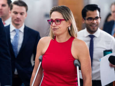 Sen. Kyrsten Sinema arrives for a Senate Homeland Security and Governmental Affairs Committee markup in Dirksen Building on June 16, 2021.