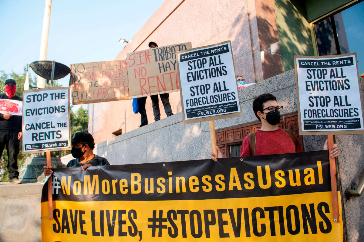 Renters and housing advocates attend a protest to cancel rent and avoid evictions in front of a court house on August 21, 2020, in Los Angeles, California.