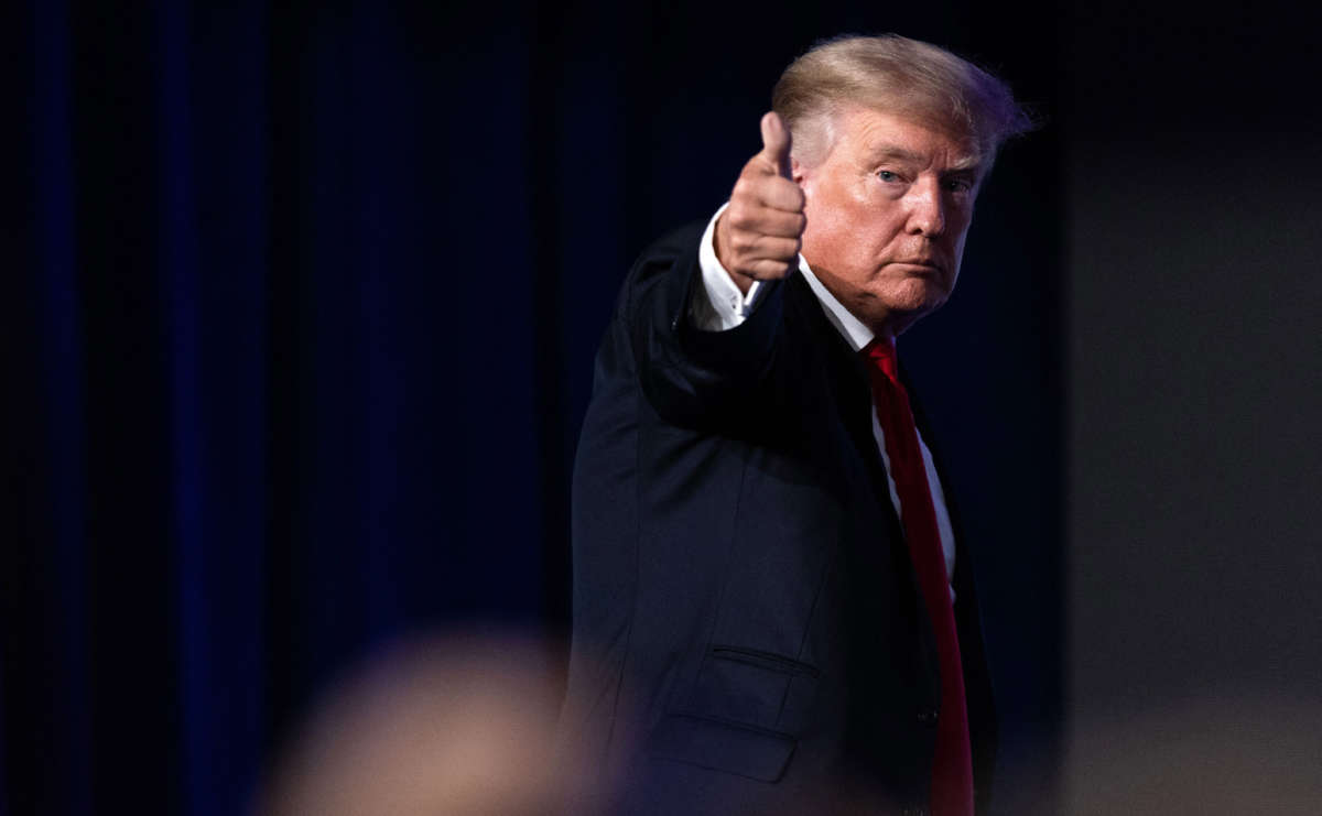 Former President Donald Trump give a thumbs up as he walks off after speaking at the Conservative Political Action Conference in Dallas, Texas, on July 11, 2021.