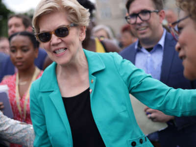 Sen. Elizabeth Warren greets supporters at a rally in front of the U.S. Supreme Court on June 9, 2021, in Washington, D.C.