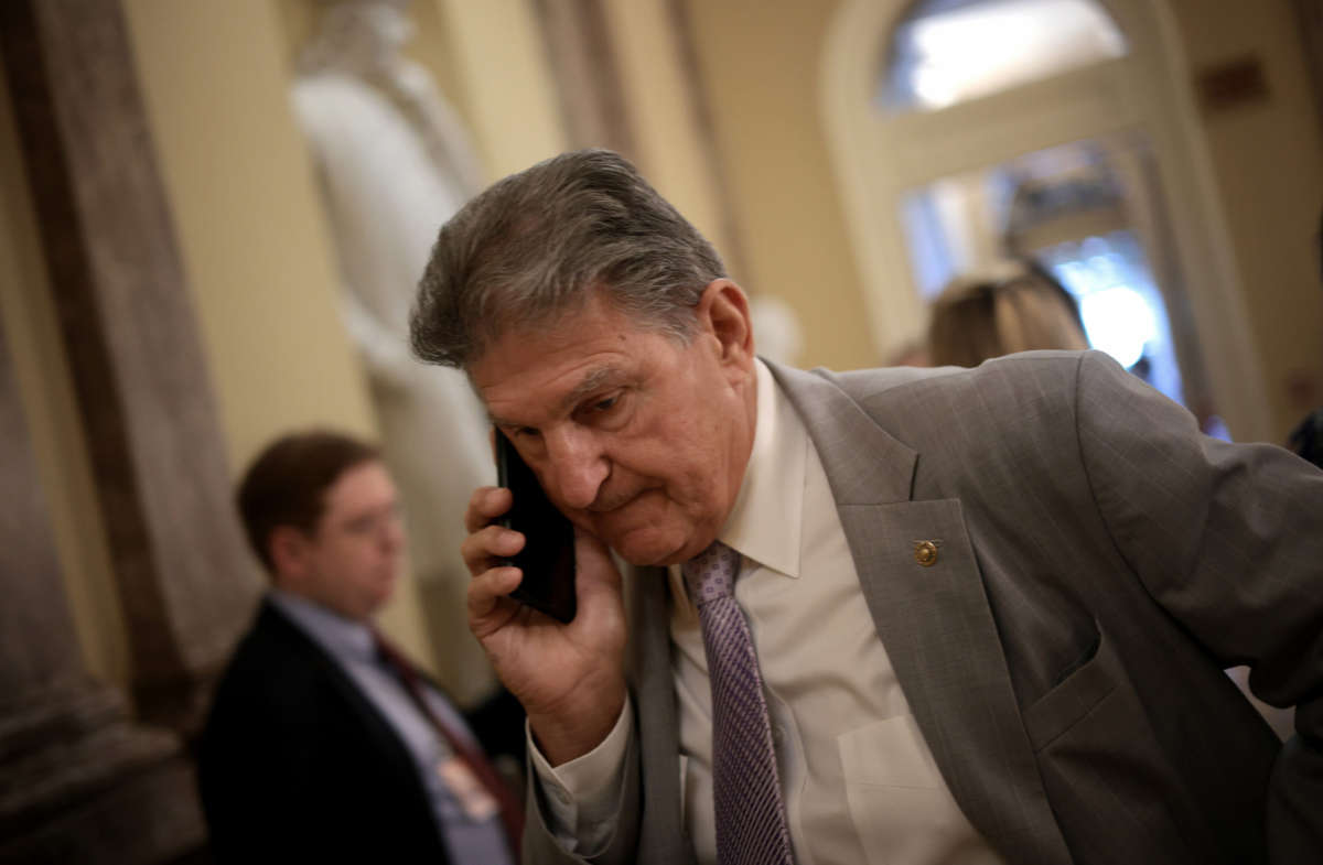 Sen. Joe Manchin arrives for a bipartisan meeting on infrastructure legislation at the U.S. Capitol on July 13, 2021, in Washington, D.C.