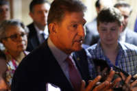 Sen. Joe Manchin talks to reporters as he leaves after a meeting with members of Texas House Democratic Caucus at the U.S. Capitol on July 15, 2021, in Washington, D.C.