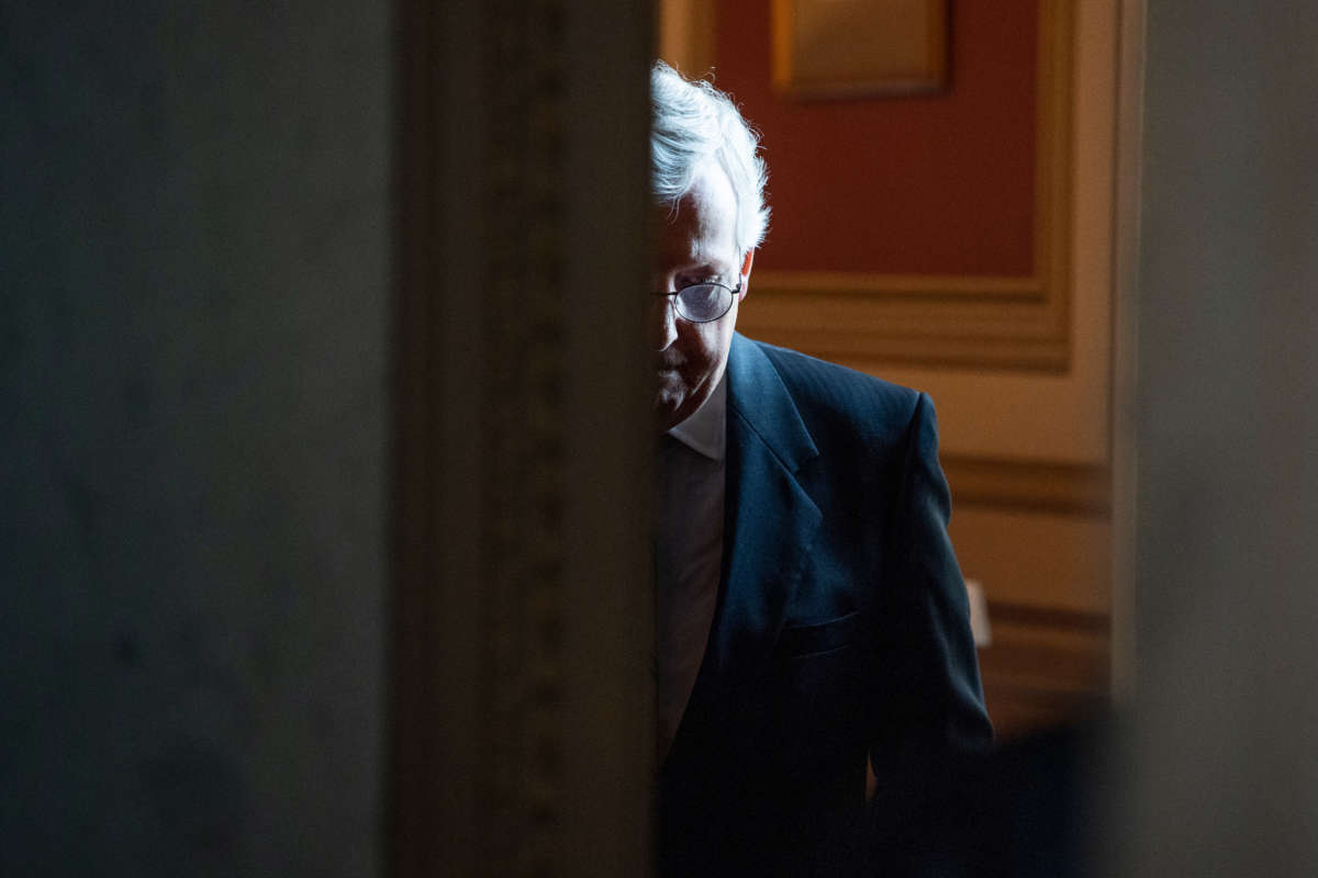 Senate Minority Leader Mitch McConnell makes his way to a news conference after the Senate Republican policy luncheon in the Capitol on July 20, 2021.