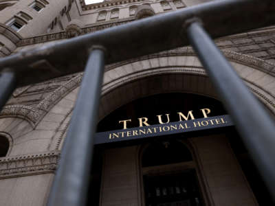 The Trump International Hotel is seen though security fencing on June 2, 2021, in Washington, D.C.