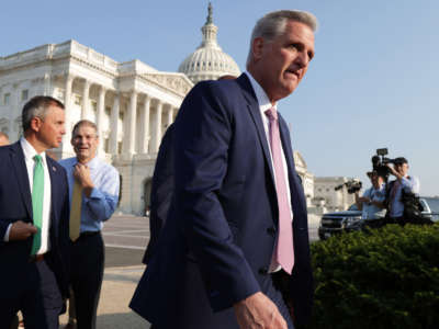 House Minority Leader Rep. Kevin McCarthy, right, Rep. Kelly Armstrong, left, and Rep. Jim Jordan, 2nd left, arrive at a news conference in front of the U.S. Capitol, on July 27, 2021, in Washington, D.C.