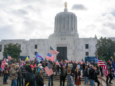 Protesters gather in front of the Oregon state capitol building during a "Stop the Steal" rally on November 7, 2020, in Salem, Oregon.