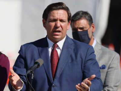 Florida Gov. Ron DeSantis speaks during a press conference about the opening of a COVID-19 vaccination site at the Hard Rock Stadium on January 6, 2021, in Miami Gardens, Florida.