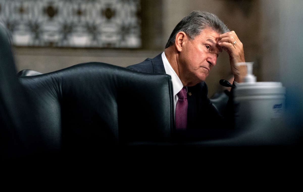 Sen. Joe Manchin pauses during a Senate Armed Services Committee hearing at the Dirksen Senate Office building on Capitol Hill on September 28, 2021, in Washington, D.C.