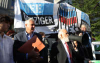 Attorney Steven Donziger, second left, is seen at a rally held in front of the Manhattan Court House ahead of sentencing in a contempt case in New York City on October 1, 2021.