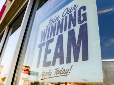 A help wanted sign reads "Join Our Winning Team, Apply Today!" in the window of a Jersey Mike's Subs location in Muhlenberg, Pennsylvania, on August 26, 2021.