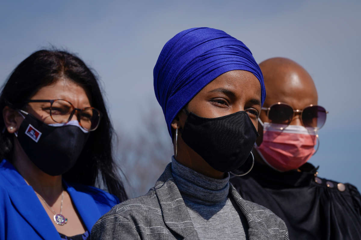 From left, Representatives Rashida Tlaib, Ilhan Omar and Ayanna Pressley attend a news conference outside the U.S. Capitol on March 11, 2021, in Washington, D.C.