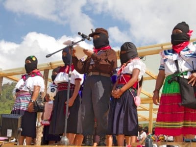 Zapatista women take the stage to deliver their speeches collectively from each Caracol, or administrative center.