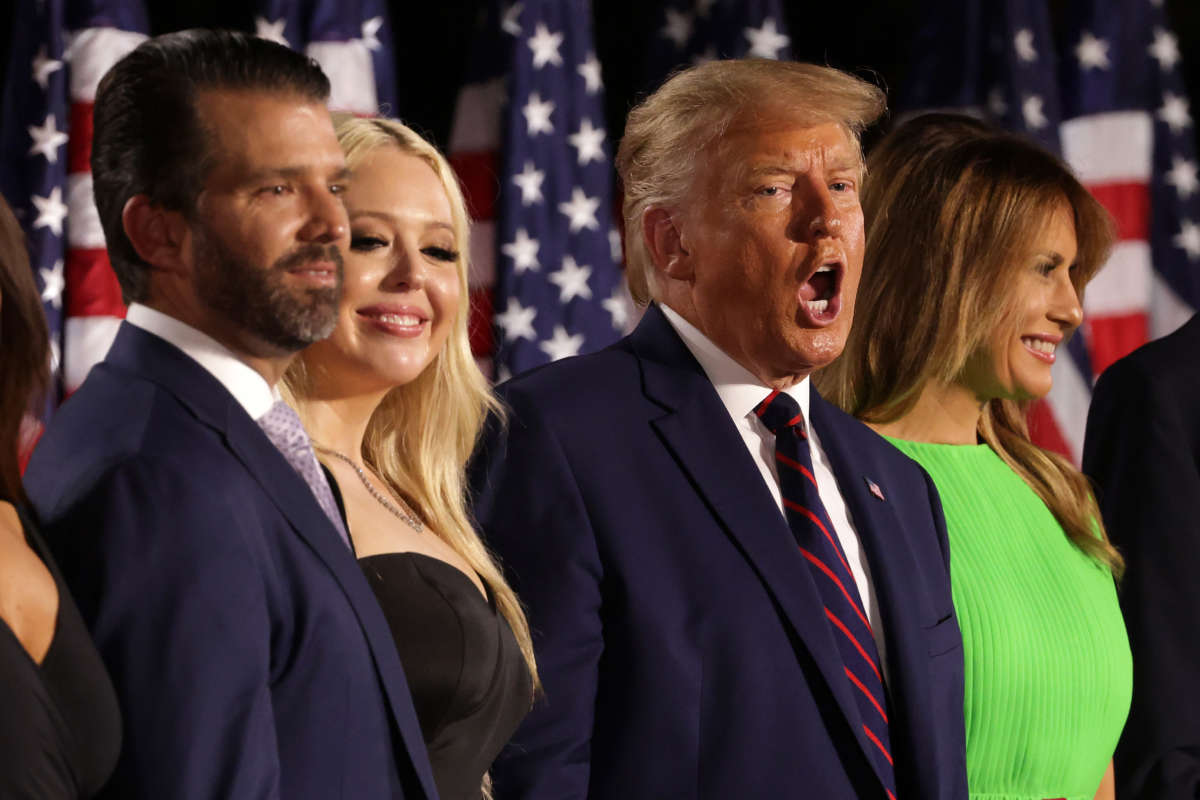 Donald Trump screams while surrounded by his hideous family