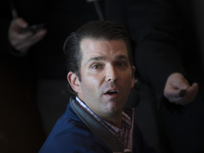 Donald Trump Jr. answers questions from reporters while touring Sarris Candies with Rick Saccone, Republican congressional candidate for Pennsylvania's 18th district, March 12, 2018, in Cannonsburg, Pennsylvania.