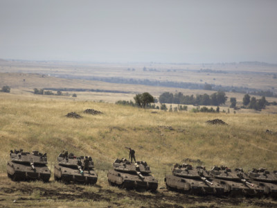 Israeli Merkava tanks are deployed near the Israeli-Syrian border on May 10, 2018, in the Israeli-annexed Golan Heights.