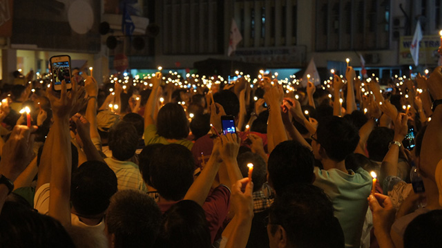 (Photo: Candle Vigil via Shutterstock)