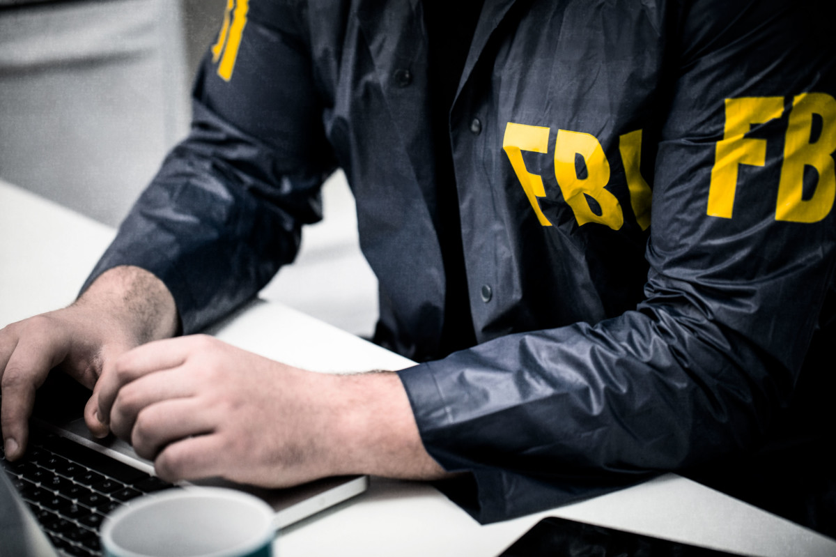 FBI agent on a computer