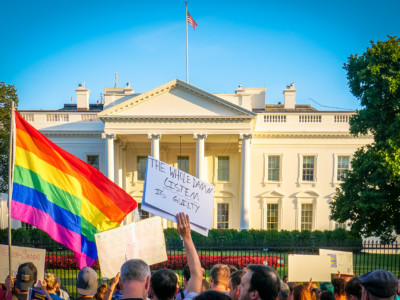 Protesters rally against Donald Trump's ban on transgender people serving in the military in front of the White House on July, 26, 2017.