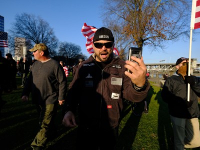 Joey Gibson, leader of the Patriot Prayer group, leads his supporters along the waterfront in Portland, Oregon, on December 9, 2017.