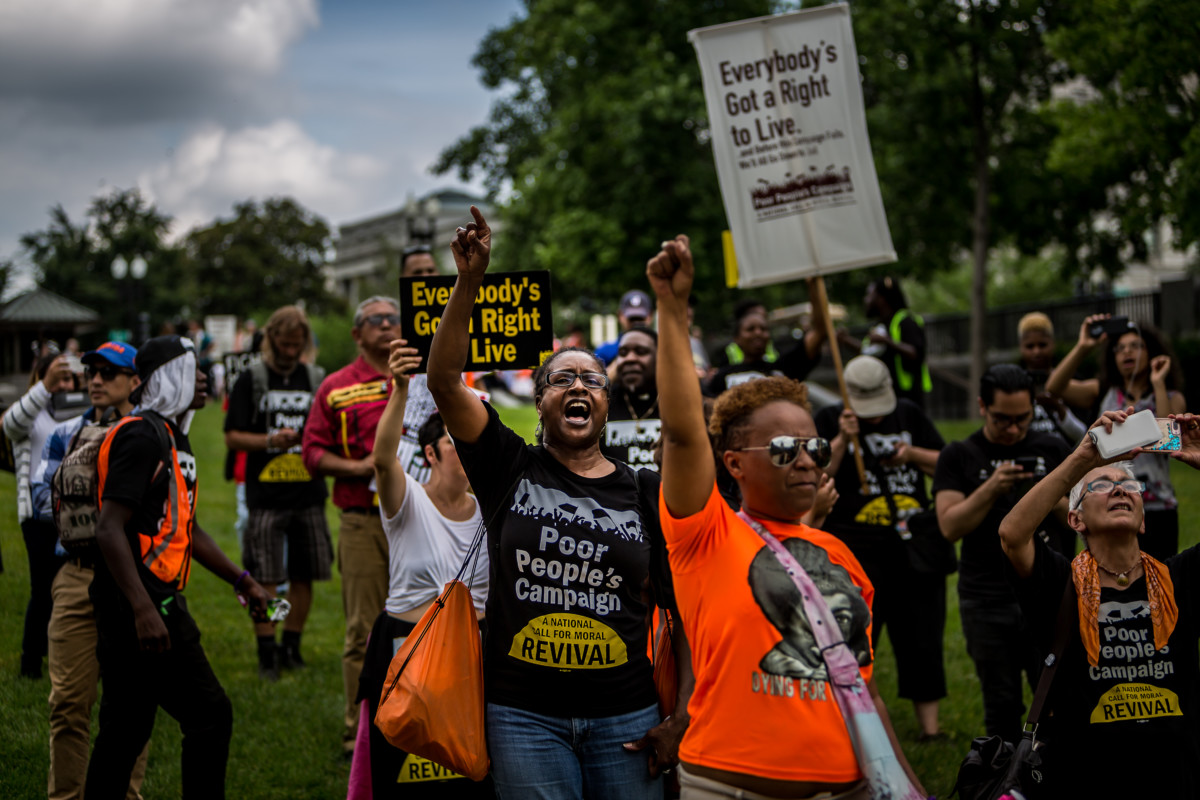 Poor People's Campaign participants march to the US Capitol to protest the Trump administration and congressional policy against immigrant children and families, June 21, 2018. Over 100 people were arrested.