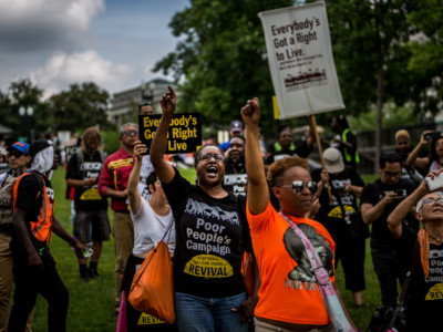Poor People's Campaign participants march to the US Capitol to protest the Trump administration and congressional policy against immigrant children and families, June 21, 2018. Over 100 people were arrested.