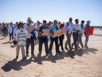 Doctors, nurses and medical students march to the entrance of the Tornillo Port of Entry in Tornillo, Texas, to demand an end to separation of immigrant children from their parents, June 23, 2018.