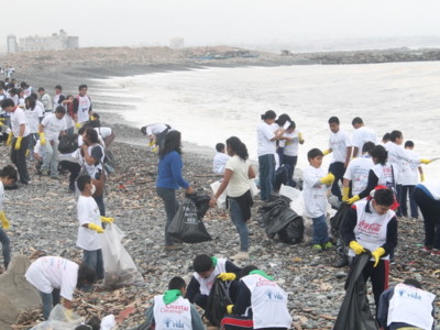 Volunteers from the Peruvian Institute for the Protection of the Environment Vida clean up the waste washed up by the sea on the coast near Lima. Half of the 6,000 tonnes of marine debris collected by the organisation since 1998, with the support of 200,000 volunteers, is disposable plastic.