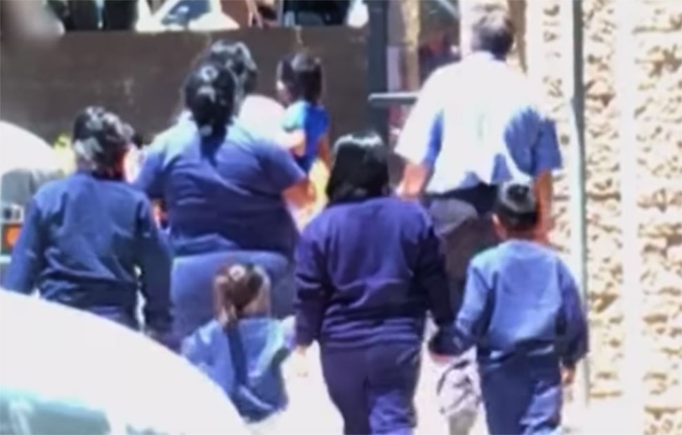 Dozens of immigrant children were detained in a vacant Phoenix office building at the height of President Trump’s family separation policy. Neighbors videotaped workers leading children into the building, which is not licensed as a child care center.