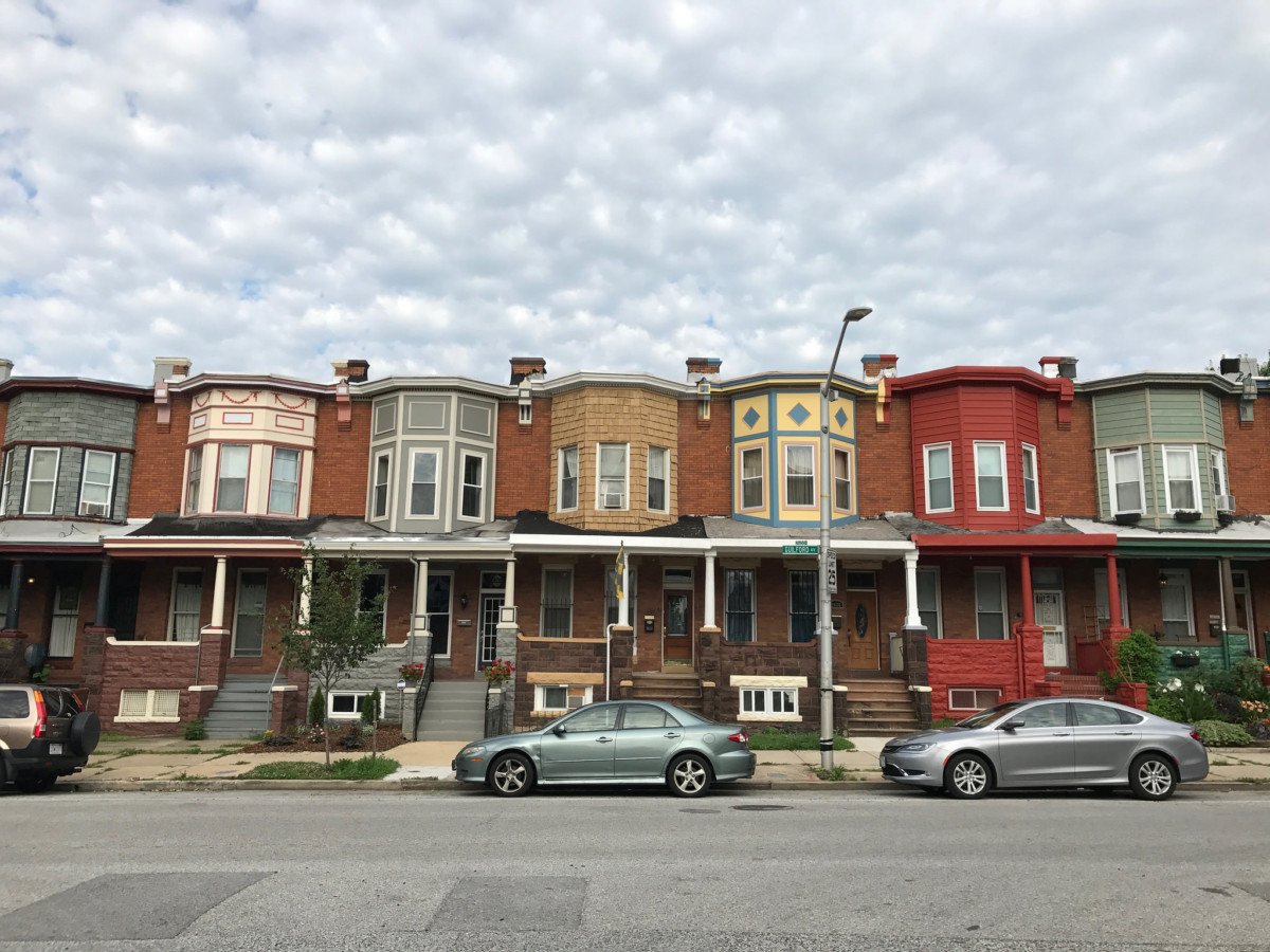 Rowhouses on Guilford Street in Baltimore, MD, taken on July 10, 2017.