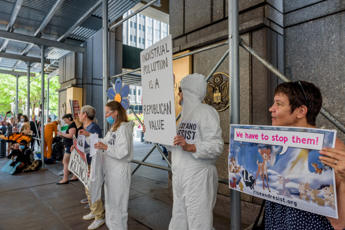 Activist group Rise and Resist joins environmental advocacy organizations for a protest outside the Environmental Protection Agency offices in downtown Manhattan.