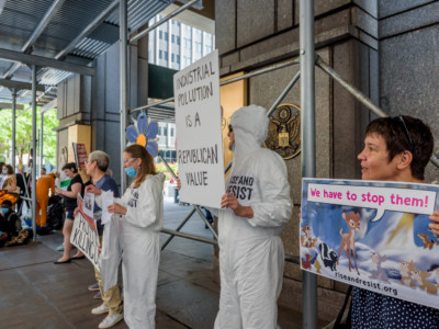 Activist group Rise and Resist joins environmental advocacy organizations for a protest outside the Environmental Protection Agency offices in downtown Manhattan.