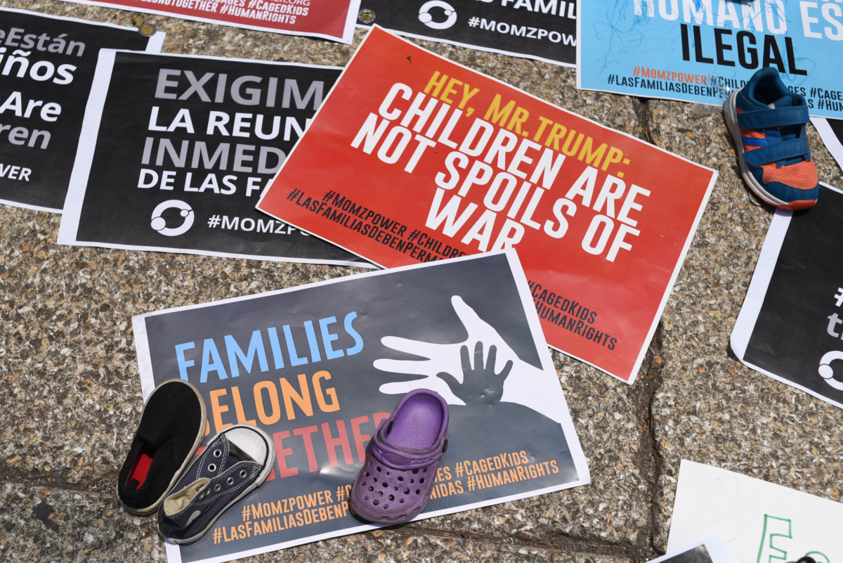 View of signs during a protest against US immigration policies outside the US embassy in Mexico City on June 30, 2018.
