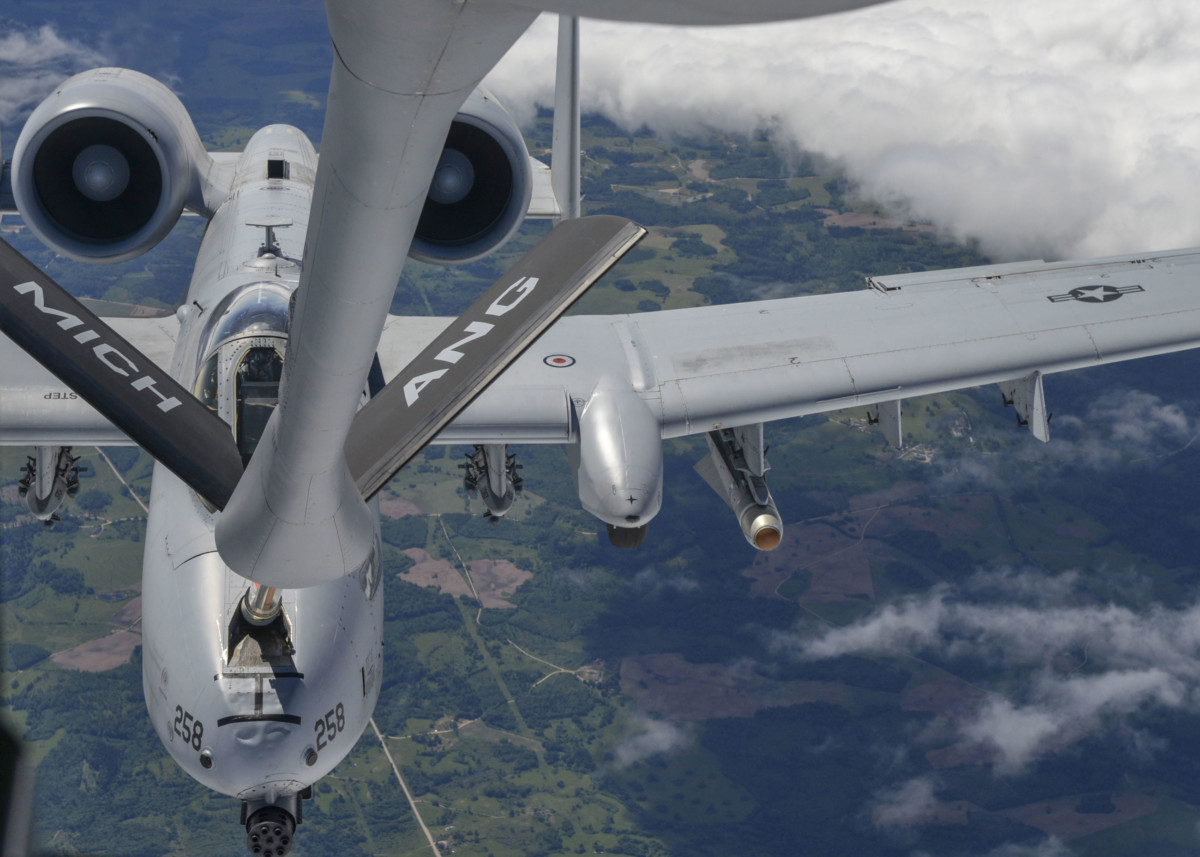 A US Air Force KC-135 Stratotanker refuels an A-10 Thunderbolt II during flight while partaking in Saber Strike 18 over Latvia on June 6, 2018.