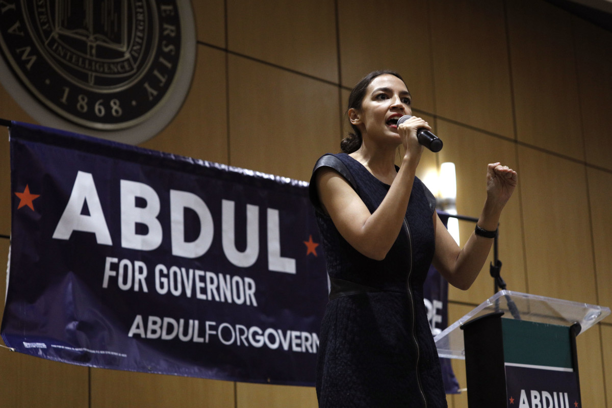New York Democratic candidate for Congress Alexandria Ocasio-Cortez campaigns for Michigan Democratic gubernatorial candidate Abdul El-Sayed at a rally on the campus of Wayne State University, July 28, 2018, in Detroit, Michigan.