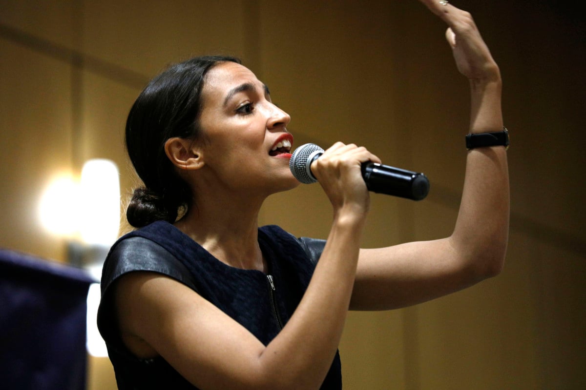 New York Democratic candidate for Congress Alexandria Ocasio-Cortez campaigns at a rally for Michigan Democratic gubernatorial candidate Abdul El-Sayed at the campus of Wayne State University, July 28, 2018, in Detroit, Michigan.