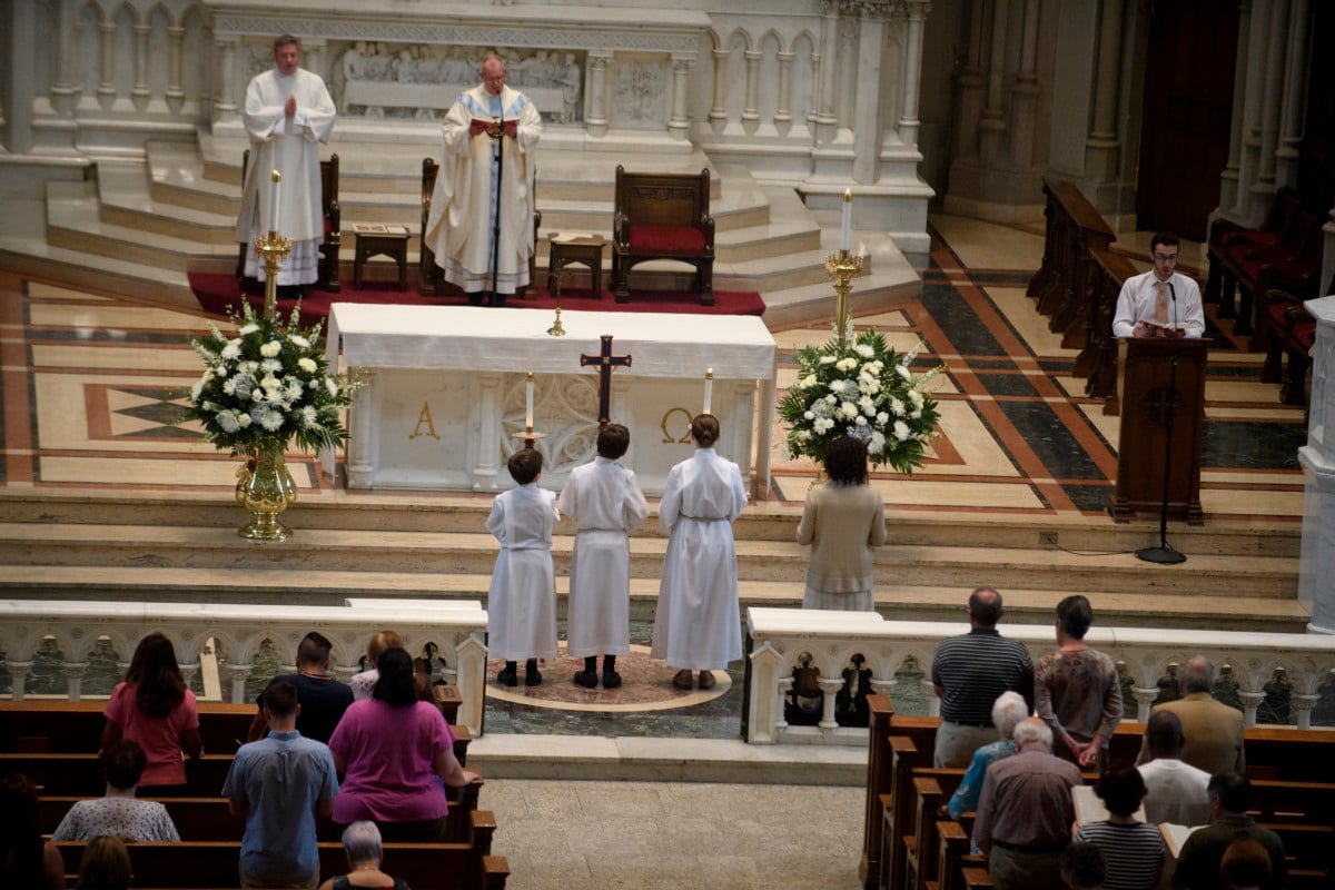 Parishioners worship during a mass to celebrate the Assumption of the Blessed Virgin Mary at St Paul Cathedral, the mother church of the Pittsburgh Diocese on August 15, 2018, in Pittsburgh, Pennsylvania. The Pittsburgh Diocese was rocked by revelations of abuse by priests the day before on August 14, 2018.