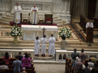 Parishioners worship during a mass to celebrate the Assumption of the Blessed Virgin Mary at St Paul Cathedral, the mother church of the Pittsburgh Diocese on August 15, 2018, in Pittsburgh, Pennsylvania. The Pittsburgh Diocese was rocked by revelations of abuse by priests the day before on August 14, 2018.