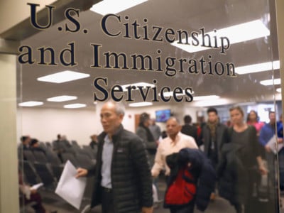 Immigrants prepare to become American citizens at a naturalization service on January 22, 2018, in Newark, New Jersey.