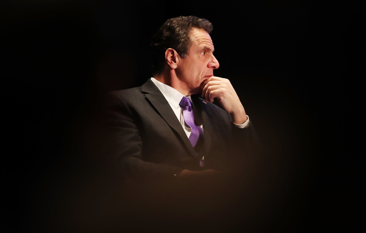 New York Governor Andrew Cuomo watches as former Vice President Al Gore speaks at an event at New York University, denouncing the Trump administration's proposal to open up new areas to offshore drilling, on March 9, 2018, in New York City.
