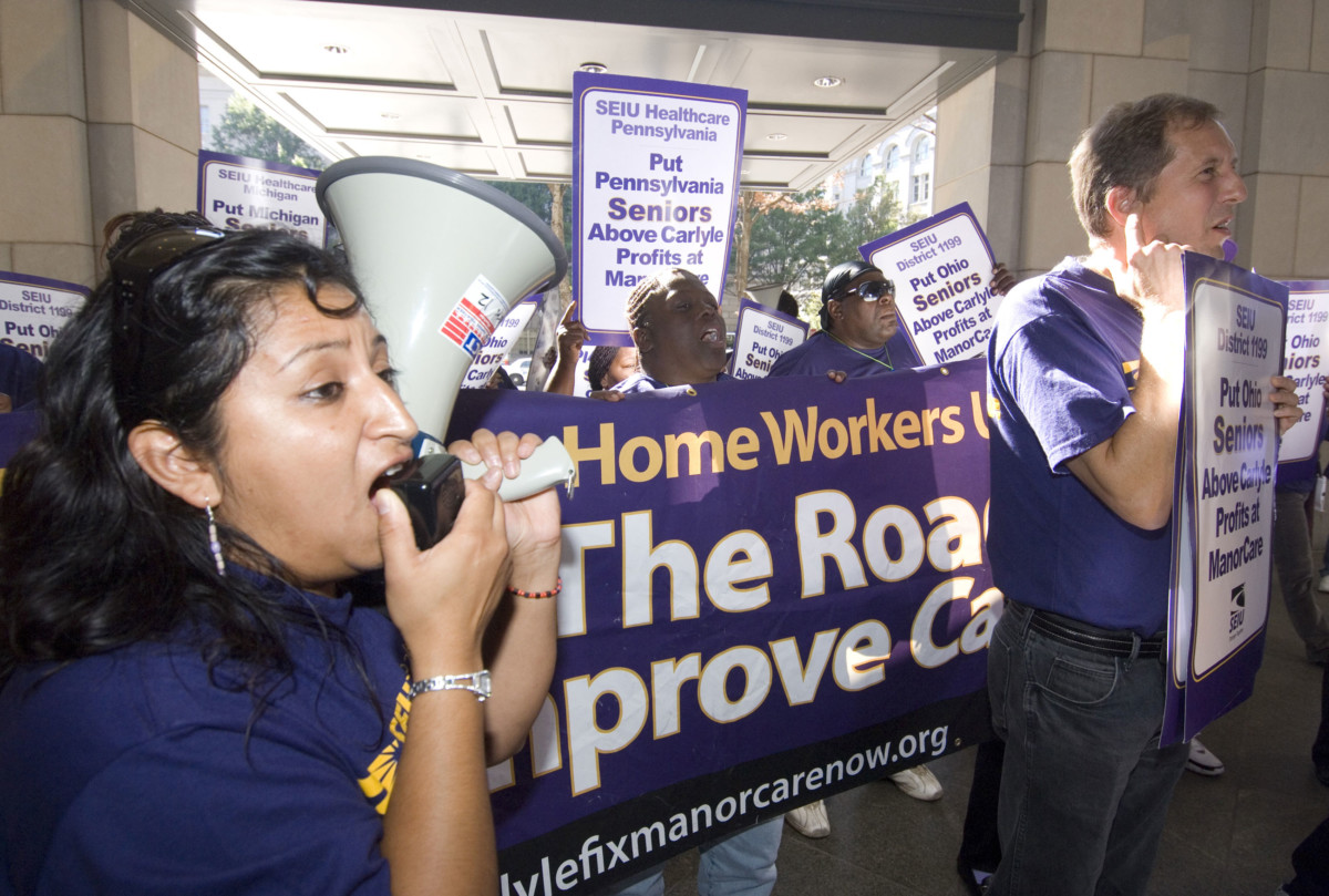 Nursing home caregivers and senior advocates with the SEIU labor union protest outside of the Carlyle Group headquarters on Pennsylvania Ave. on October 22, 2007.